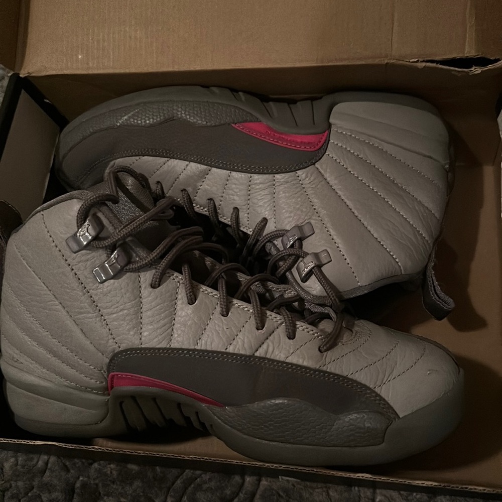 Gray and pink Jordan 12s